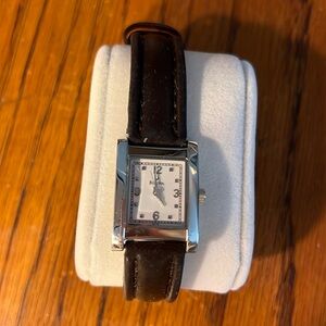 Bulova women’s watch. Stainless steel/leather. EUC. Needs battery.